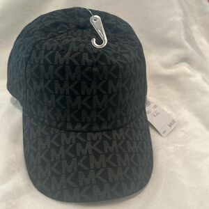 NWT Michael Kors Signature Monogram fabric gray/black cap with adjustable back.